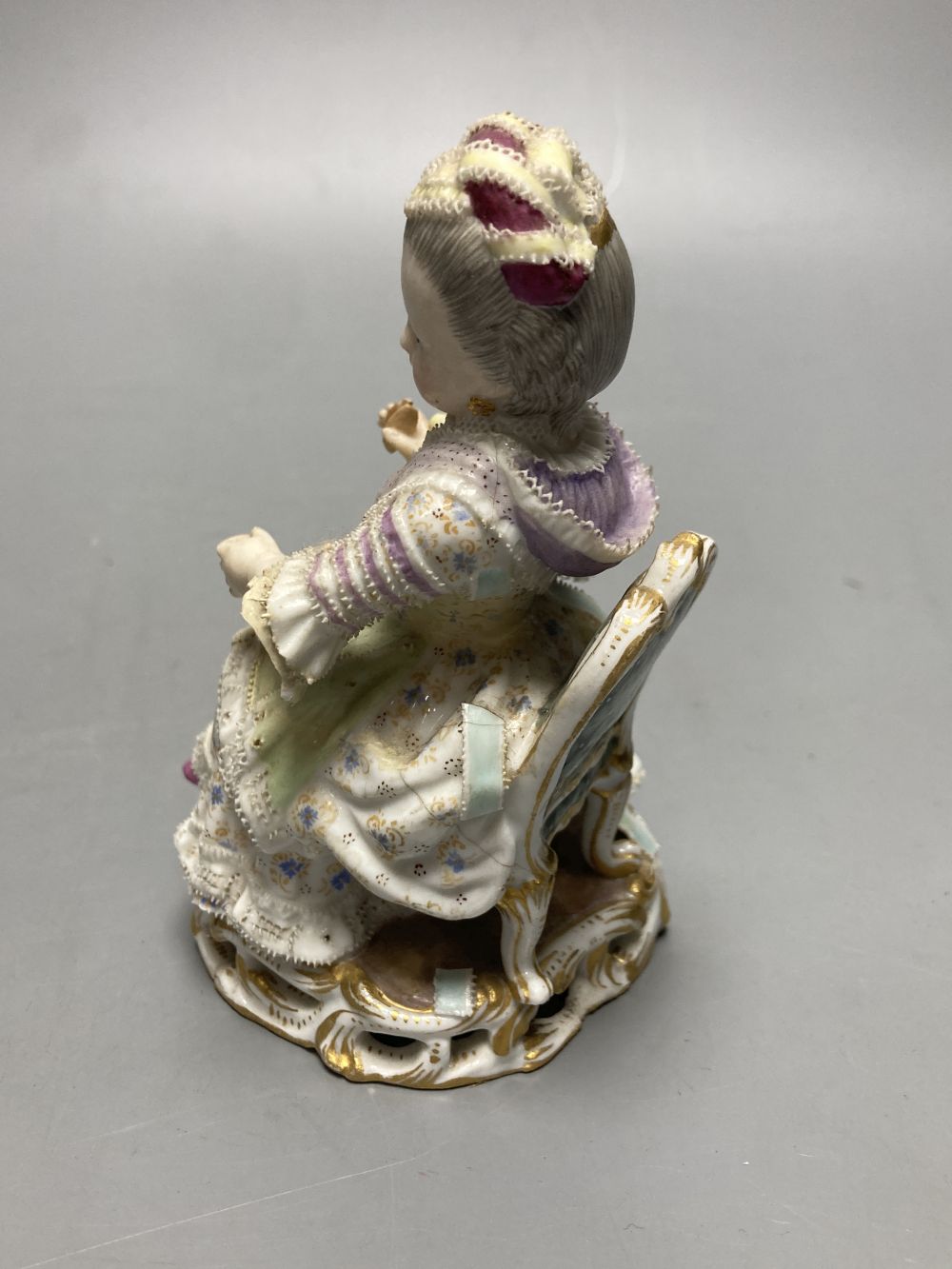 A pair of Meissen figures in 18th century dress, height 13cm